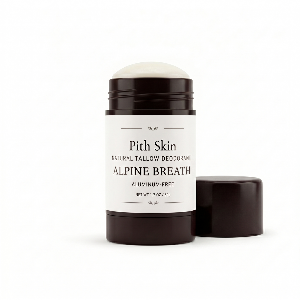Pith Skin Alpine Breath Natural Tallow Deodorant uncapped, showing the cream-colored alpine-scented tallow stick